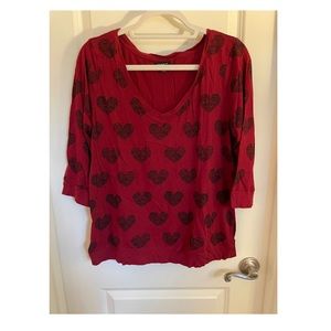 Torrid red jersey with heart pattern, size 1